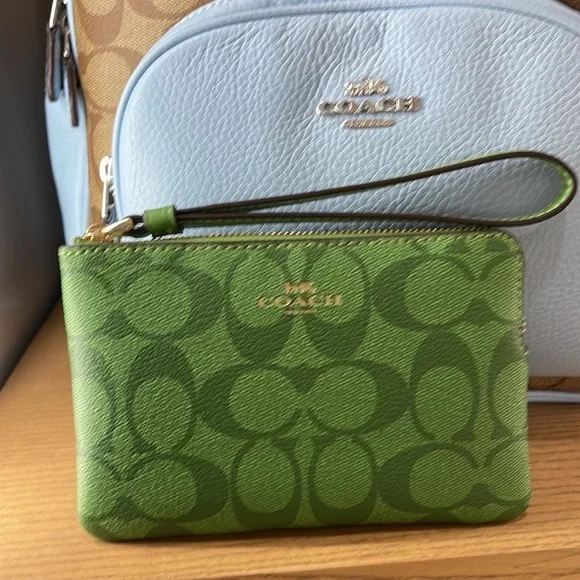 Coach Corner Zip Wristlet In Signature Canvas 
Im/Neon Green - Picture 12 of 16